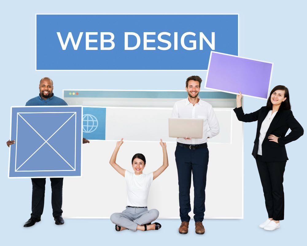 Group of professionals holding up signs promoting web design services.